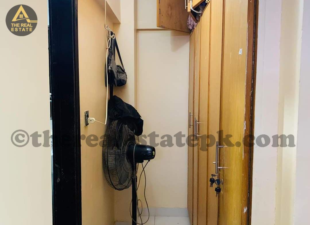 furnished bedroom in gulistan-e-johar apartment