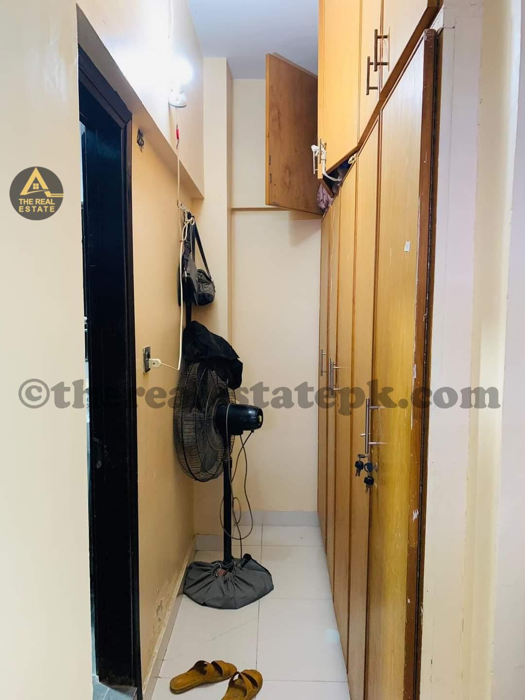 furnished bedroom in gulistan-e-johar apartment